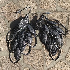 A pair of sparkly dangling earrings
